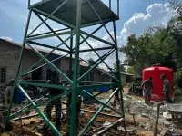 Satgas TMMD Pasang Pipa Tandon Sumur Bor, Air Bersih Segera Mengalir di Nagori Limag