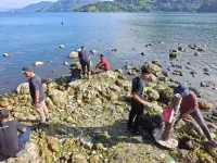 KHAS Parapat Hotel Gelar Aksi Bersih Lingkungan di Kawasan Danau Toba