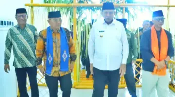 Hadiri PENAS Petani Nelayan XVII, Bupati Simalungun Disambut Adat Mototilolo di Gorontalo