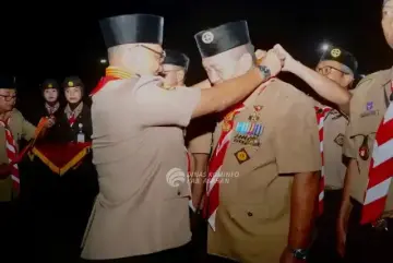 Bupati Asahan Terima Tanda Penghargaan Lencana Melati dari Ketua Kwarnas Gerakan Pramuka