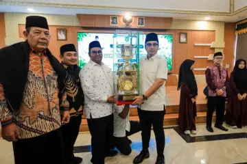 Piala Bergilir MTQ Sumut kembali ke Medan, Rico Waas Apresiasi Kafilah Dan Serahkan Bonus